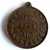 Žatecká pamětní Kudlichova medaile z roku 1888. Zapůjčil M. Klouček.